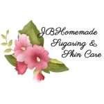 Logo of JBHomemade featuring elegant text and beautiful pink flowers, representing the brand’s focus on organic and natural skin care products.