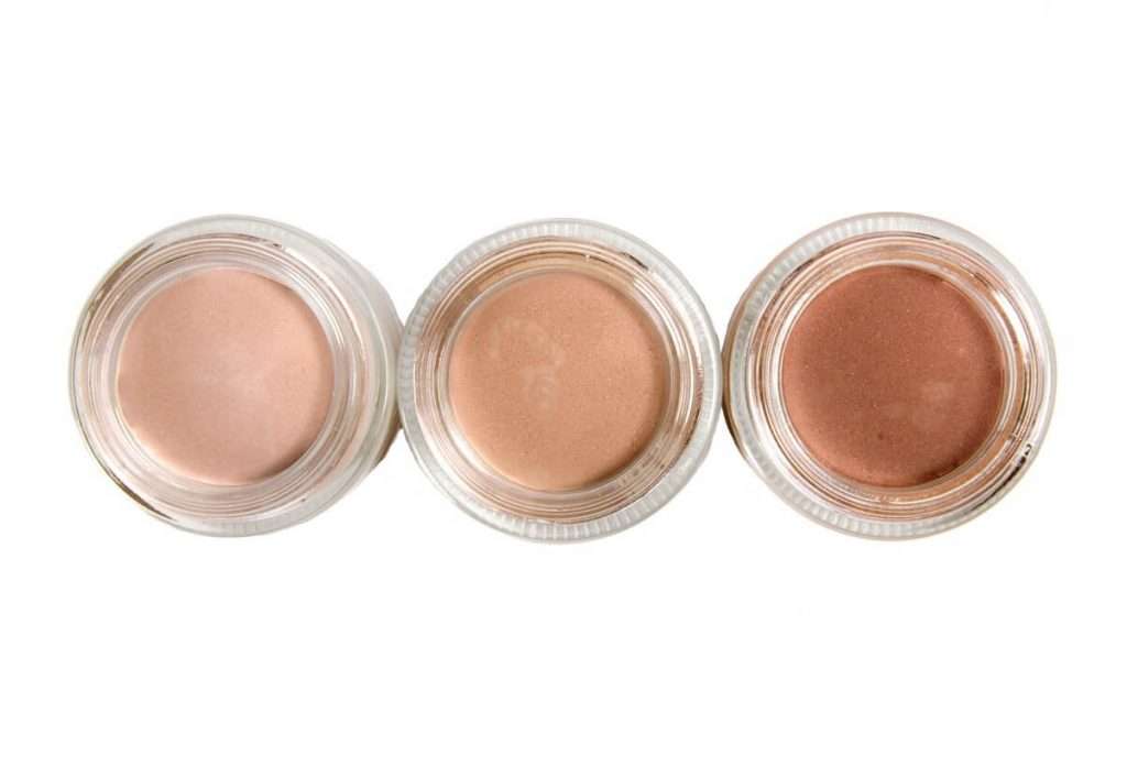 Closeup overhead view of 3 shades of makeup