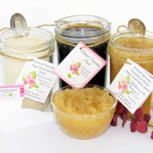 The bundle includes an 8 oz mason jar filled with firm sugaring paste, a jar of Rosemary Eucalyptus Herbal Sugar Body Scrub, and Colloidal Oatmeal Brown Sugar Dry Body Scrub, a small bottle of pure aloe vera, a pouch of cornstarch, an applicator, and a glass bowl showcasing the sugar scrub, garnished with sprinkles of rosemary and a sprig of eucalyptus.