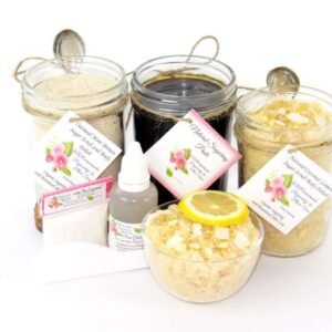 The bundle includes an 8 oz mason jar filled with firm sugaring paste, a jar of Coconut Lemon Sugar Body Scrub, and Colloidal Oatmeal Brown Sugar Dry Body Scrub, a small bottle of pure aloe vera, a pouch of cornstarch, an applicator, and a glass bowl showcasing the sugar scrub, garnished with coconut shavings and a slice of lemon.