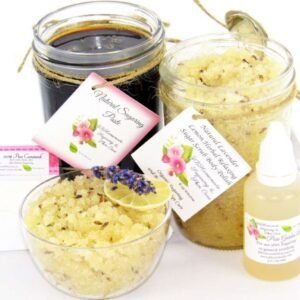 The bundle includes an 8 oz mason jar filled with firm sugaring paste, a jar of Lavender Lemon Herbal Relaxing Sugar Body Scrub, a small bottle of pure aloe vera, a pouch of cornstarch, an applicator, and a glass bowl showcasing the sugar scrub, garnished with a lavender sprig and a slice of lemon.