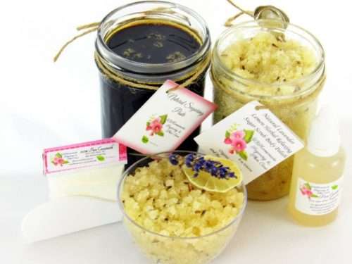The bundle includes an 8 oz mason jar filled with firm sugaring paste, a jar of Lavender Lemon Herbal Relaxing Sugar Body Scrub, a small bottle of pure aloe vera, a pouch of cornstarch, an applicator, and a glass bowl showcasing the sugar scrub, garnished with a lavender sprig and a slice of lemon.