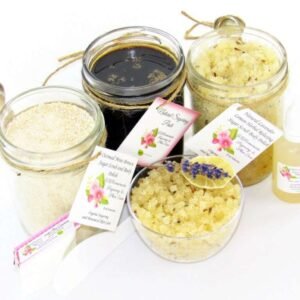 The bundle includes an 8 oz mason jar filled with firm sugaring paste, a jar of Lavender Lemon Herbal Relaxing Sugar Body Scrub, and Colloidal Oatmeal Brown Sugar Dry Body Scrub, a small bottle of pure aloe vera, a pouch of cornstarch, an applicator, and a glass bowl showcasing the sugar scrub, garnished with a lavender sprig and a slice of lemon.