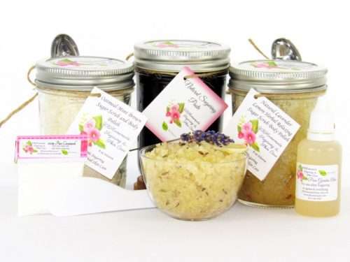 The bundle includes an 8 oz mason jar filled with firm sugaring paste, a jar of Lavender Lemon Herbal Relaxing Sugar Body Scrub, and Colloidal Oatmeal Brown Sugar Dry Body Scrub, a small bottle of pure aloe vera, a pouch of cornstarch, an applicator, and a glass bowl showcasing the sugar scrub, garnished with a lavender sprig and a slice of lemon.