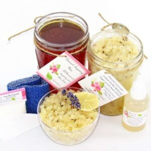 The bundle includes an 8 oz mason jar filled with soft sugaring wax, a jar of Lavender Lemon Herbal Relaxing Sugar Body Scrub, a small bottle of pure aloe vera, denim strips, a pouch of cornstarch, an applicator, and a glass bowl showcasing the sugar scrub, garnished with a lavender sprig and a slice of lemon.