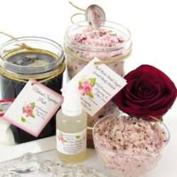 The bundle includes an 8 oz mason jar filled with firm sugaring paste, a jar of Red Rose Petal Sugar Body Scrub, a small bottle of pure aloe vera, a pouch of cornstarch, an applicator, and a glass bowl showcasing the sugar scrub, garnished with a red rose bloom.