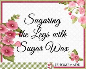 Hollyhock Logo for JBHomemade Sugaring and Skin Care with pink and green elements framing a title of ‘Sugaring the Legs with Sugar Wax’