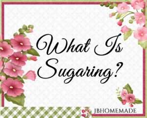 Hollyhock Logo for JBHomemade Sugaring and Skin Care with pink and green elements framing a title of ‘What Is Sugaring'