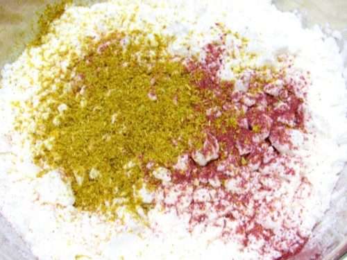 A blend of chamomile and red rose ingredients mixed together, offering a visual representation of the natural components making up the Grace and Presence powder.