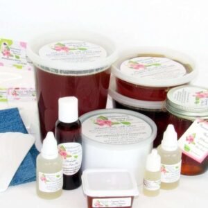 A variety of JBHomemade sugaring wax containers, pure aloe vera bottles, cornstarch pouches, applicators, and denim strips for complete skin care. The image showcases a collection of JBHomemade Sugaring Wax in various container sizes including tubs and masons alongside bottles of pure garden-fresh aloe vera, pouches of cornstarch, applicators, and denim strips arranged aesthetically against a white background. The assortment includes 16 Oz (two half pint masons), 16 Oz Tub, 24 Oz (3 half pink masons), 2 Oz tub, 32 Oz tub, a 400g Tin, 8 Oz mason, and an 8 oz tub. The aloe vera bottles provide soothing aftercare, while the cornstarch pouches are used for skin preparation. Applicators and denim strips complete this comprehensive collection for effective and natural hair removal. 🌸