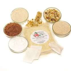 An 8 oz zip pouch of JBHomemade’s Chamomile Oatmeal Bath Soak, A selection of natural ingredients including whole oats, brown sugar, colloidal oatmeal, baking soda, and chamomile displayed in separate bowls to highlight their purity and quality.