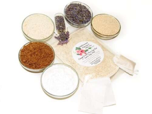 An 8 oz zip pouch of JBHomemade’s Lavender Oatmeal Bath Soak, A selection of natural ingredients including whole oats, brown sugar, colloidal oatmeal, baking soda, and lavender displayed in separate bowls to highlight their purity and quality.
