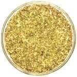 A collection of aromatic mint leaves, carefully placed in a crystal-clear glass bowl.