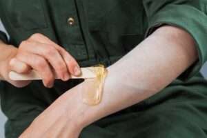 Applying Sugaring Paste Against Hair Growth: Effective Hair Removal