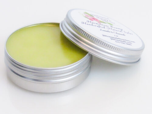 Harmonious Bounty's Creamy Natural Skin Salve in Lavender Chamomile offers a soothing remedy for dry skin with its close-up top view highlighting the product's rich texture.