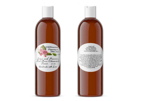 A pair of JBHomemade Sugaring and Skin Care's pure Grace and Presence Red Rose and Chamomile Toner 2 oz amber bottles on a white background. The bottle on the left displays the front label, while the bottle on the right shows the back label. The back label lists the pure ingredients, usage and care instructions, and shelf life of the product.