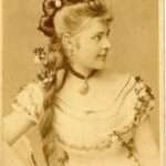 In the Victorian era, women's hair was typically kept very long. Haircuts were not common practice; instead, women might trim split ends or singe them. Long hair was considered highly feminine and attractive. Source: https://www.whizzpast.com/victorian-hairstyles-a-short-history-in-photos/
