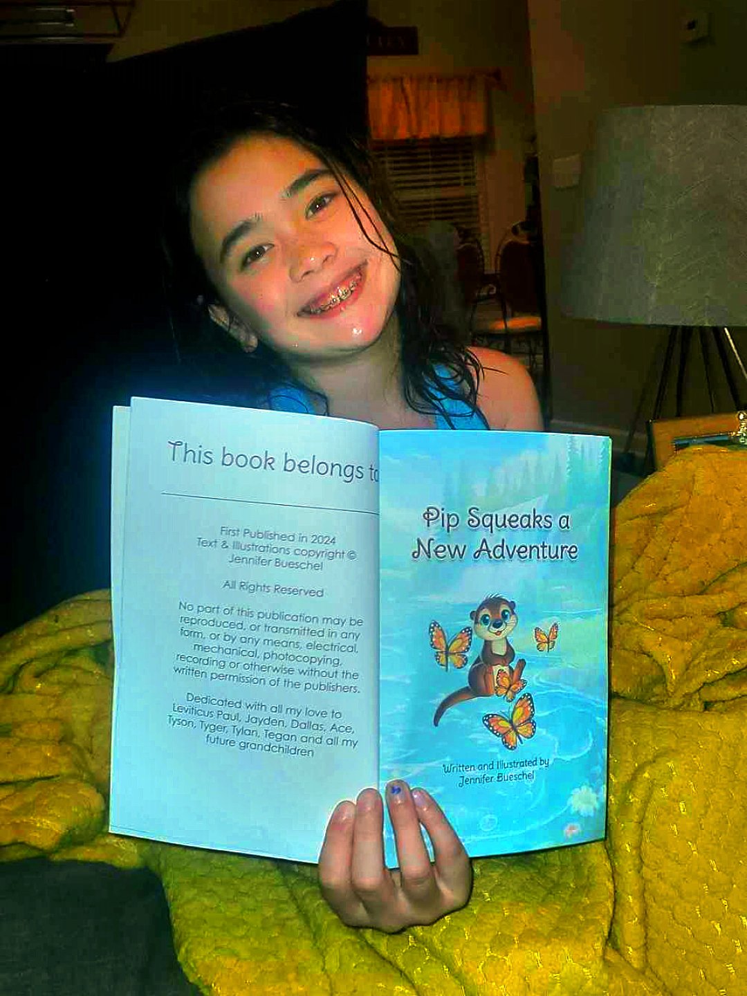 Tegan holding Pip book